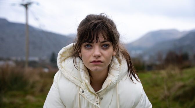 still from Effi o Blaenau showing a young woman looking directly into the camera